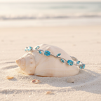 Bracelet bleu argenté sur coquillage