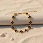 Bracelet noir sur bois flotté blanc